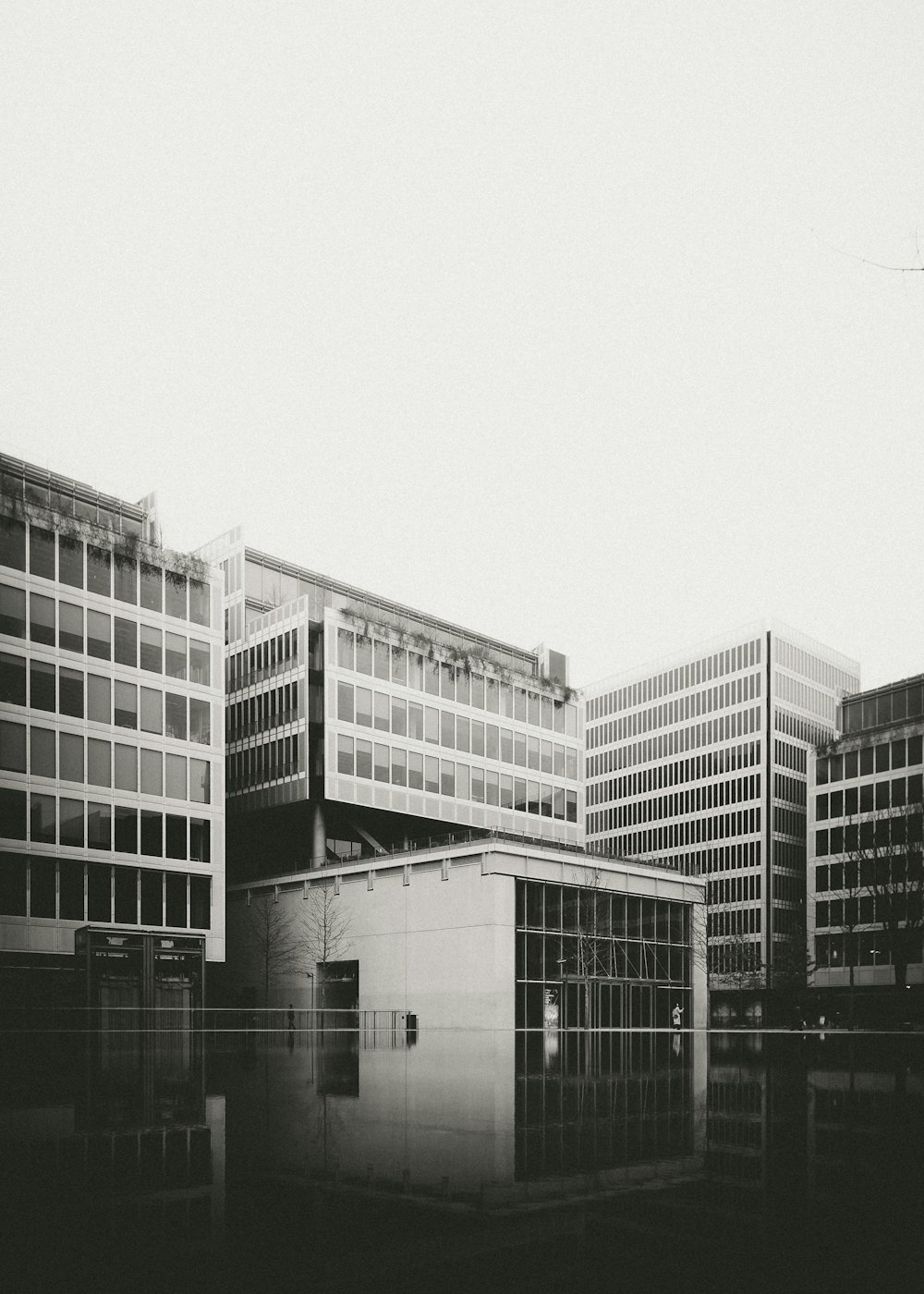 grayscale photo of concrete building