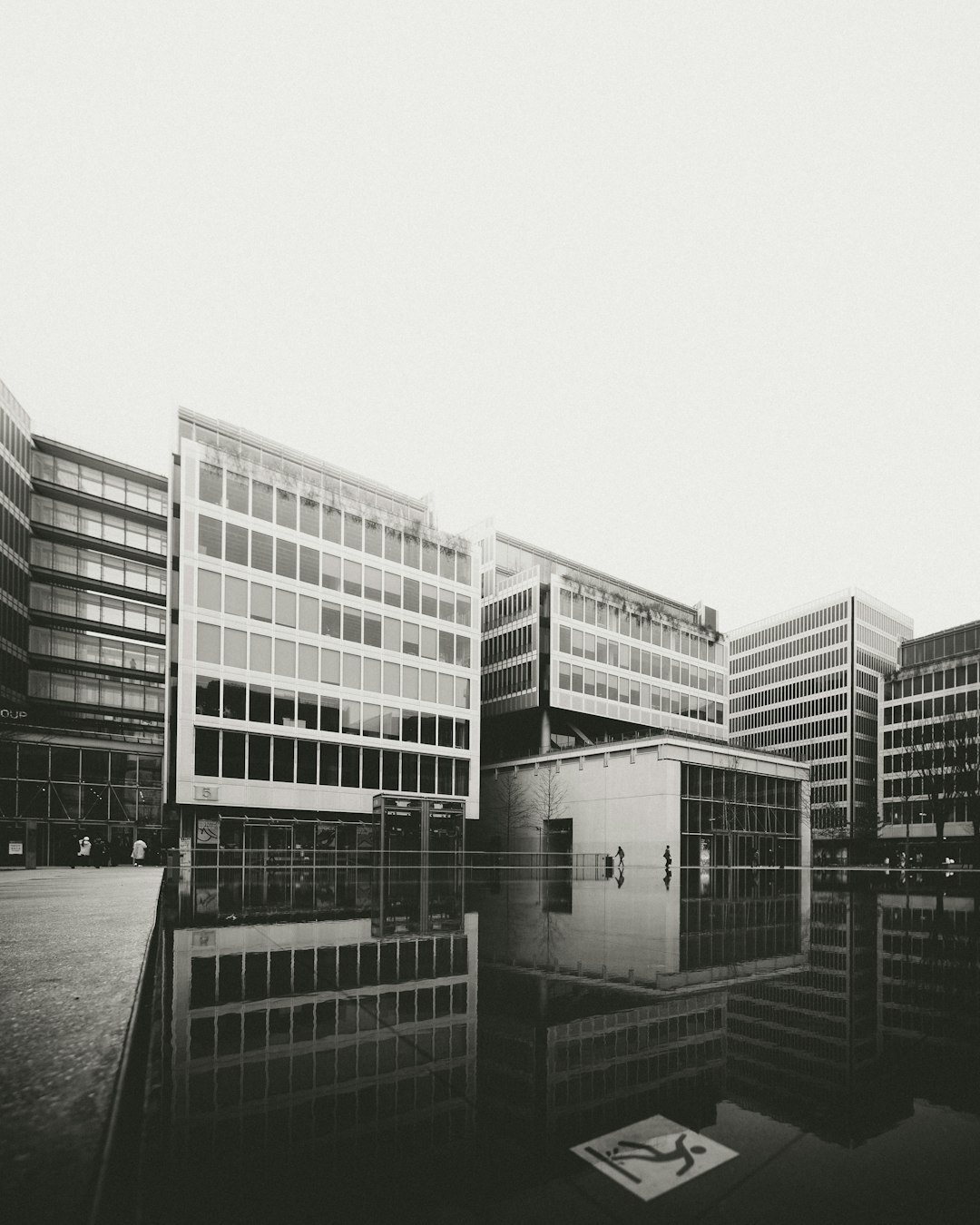 grayscale photo of concrete building