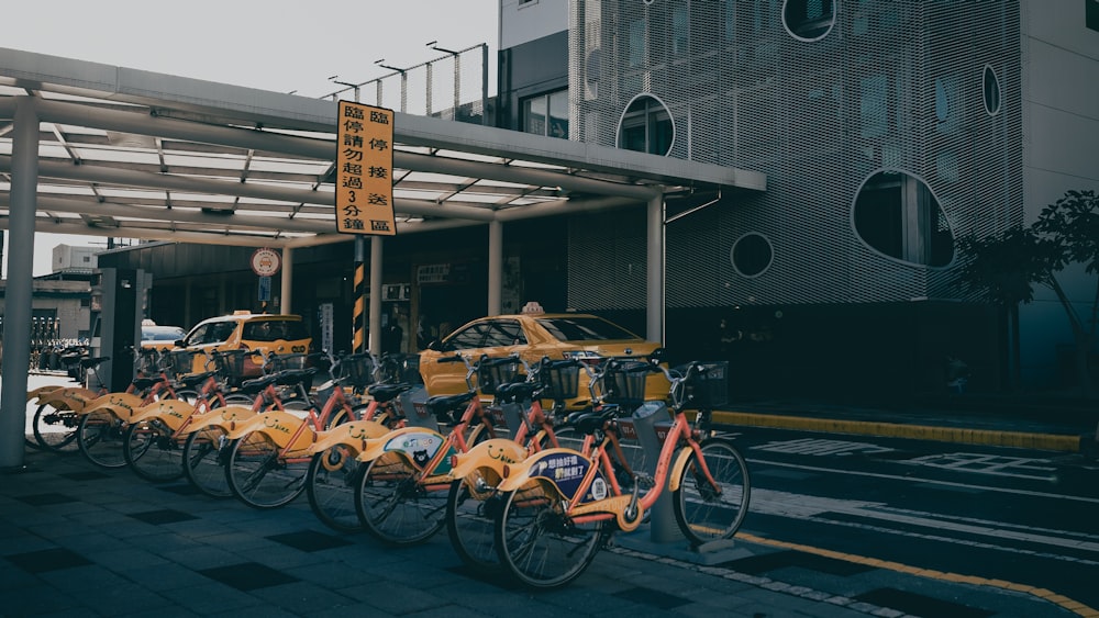 bicycles parked on the side of the road