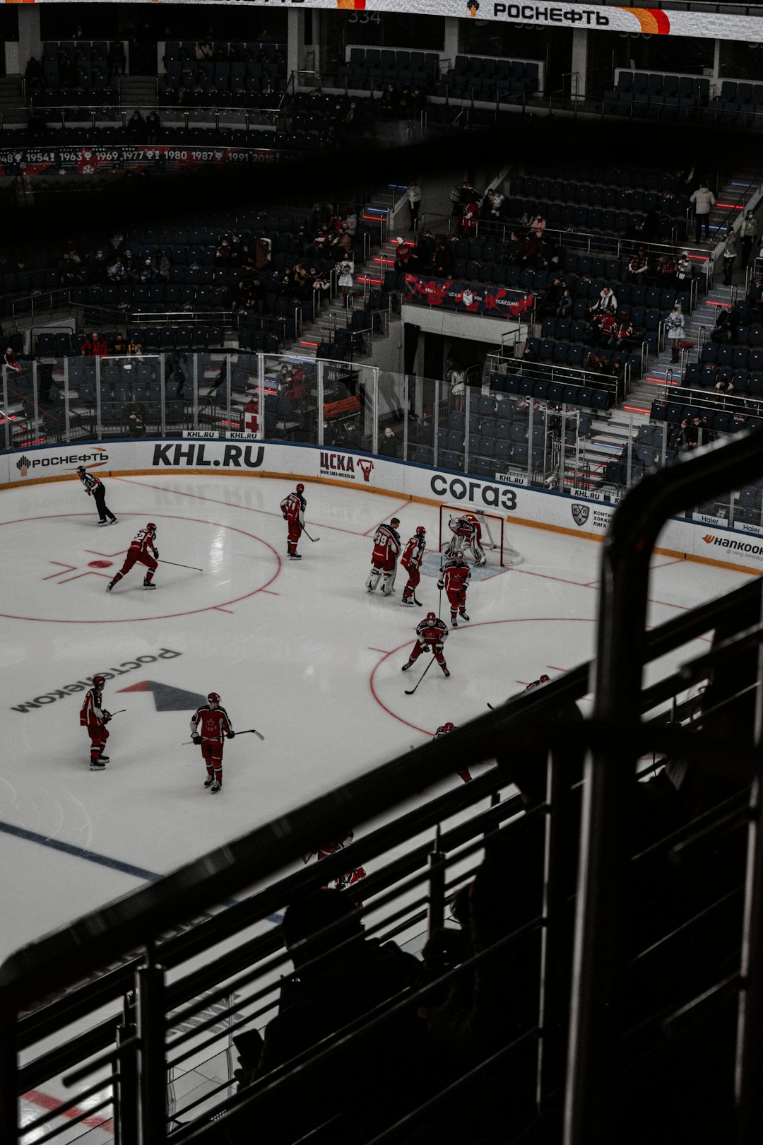 people playing ice hockey on ice hockey field