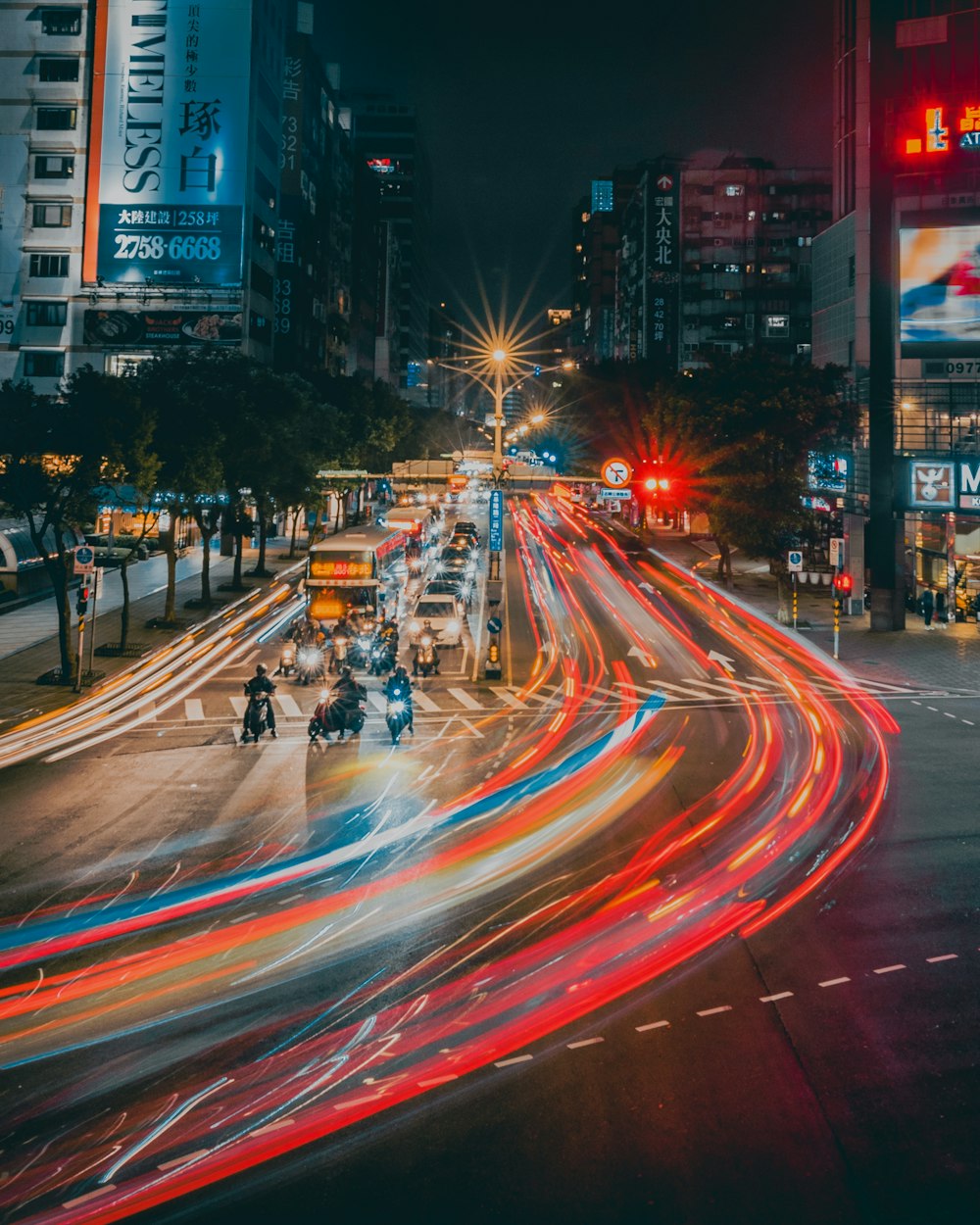 time lapse photography of cars on road during night time