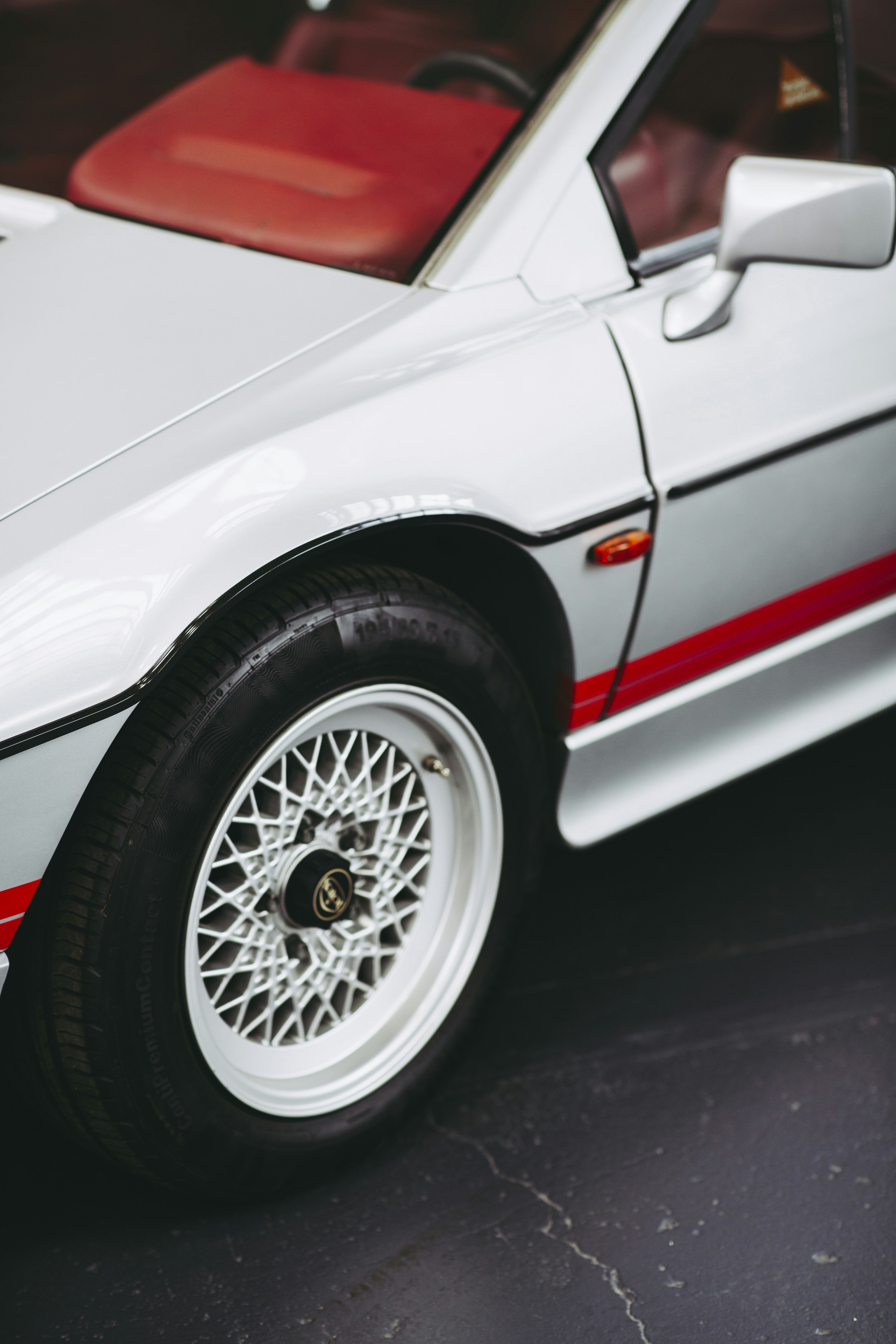White and orange car on black asphalt road photo Free Nürnberg Image