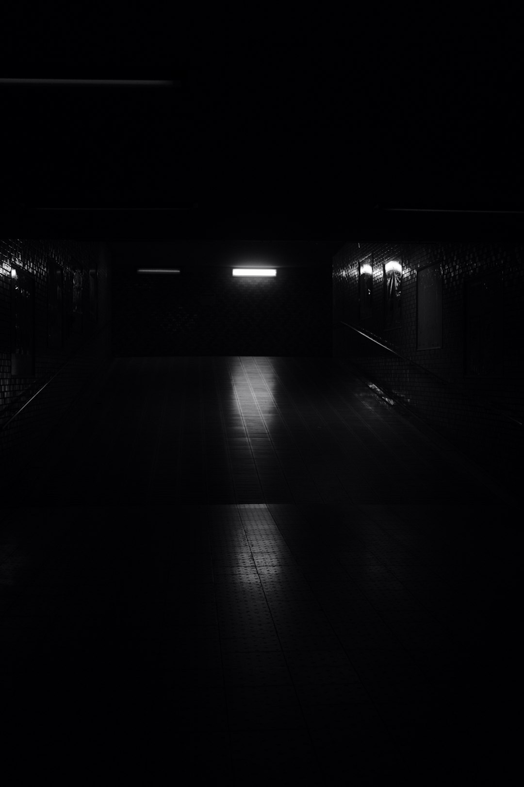 grayscale photo of empty hallway