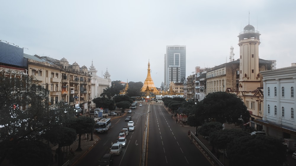 cars on road near buildings during daytime