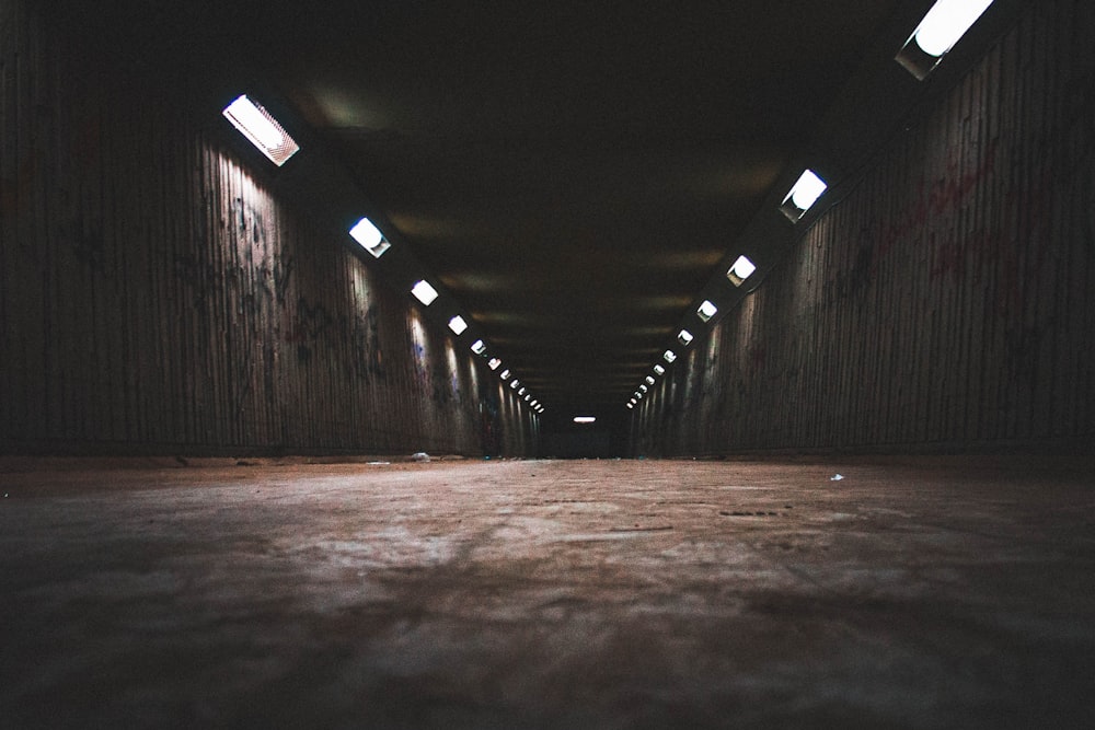 black and white tunnel with lights