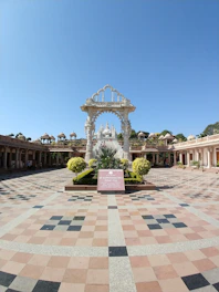 white and brown concrete building under blue sky during daytime
