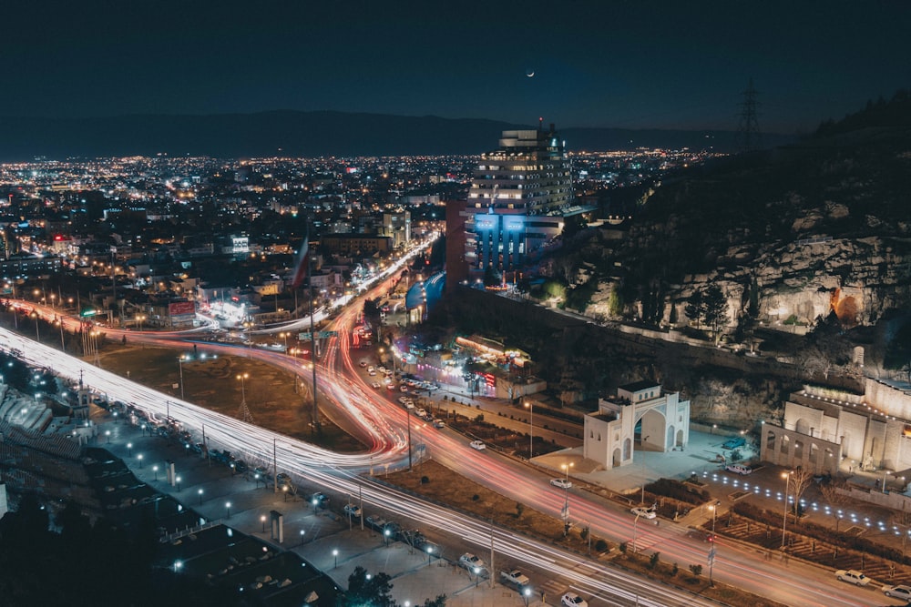 city with high rise buildings during night time