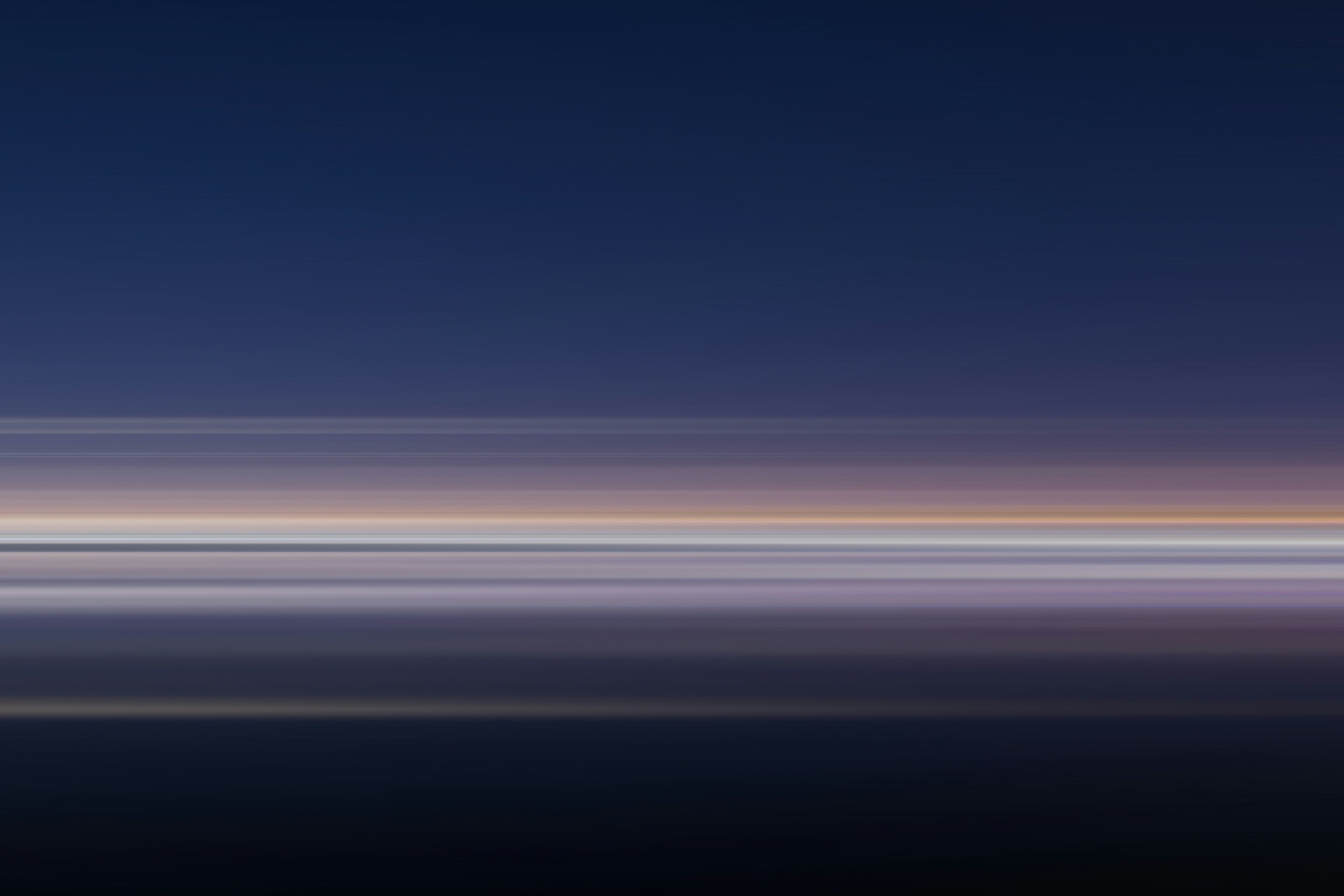 blue sky over body of water