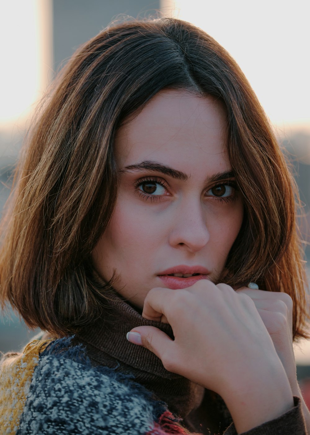 woman in black and white sweater