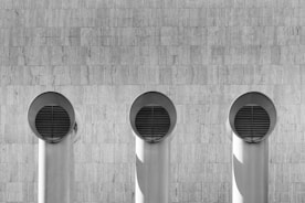 grayscale photo of round metal frame