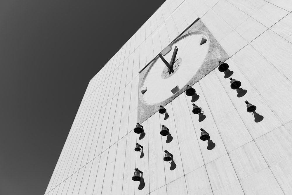 black and white round analog wall clock