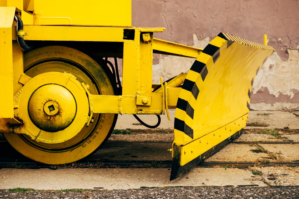 yellow and black metal wheel