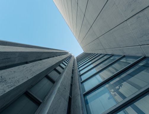 low angle photography of gray concrete building