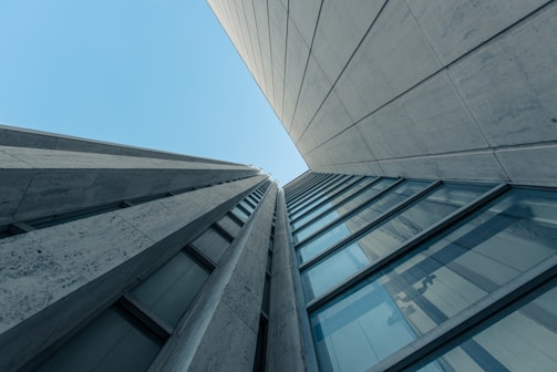 low angle photography of gray concrete building