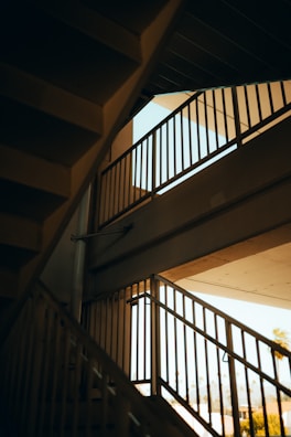 Artistic angle of a staircase with unique railing details from one of our recent projects.