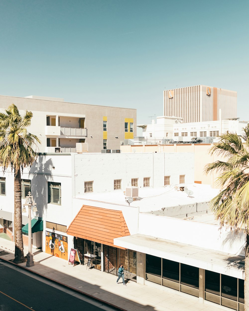 white and brown concrete building during daytime