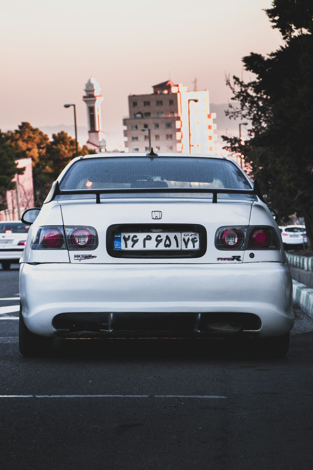 white bmw m 3 on road during daytime