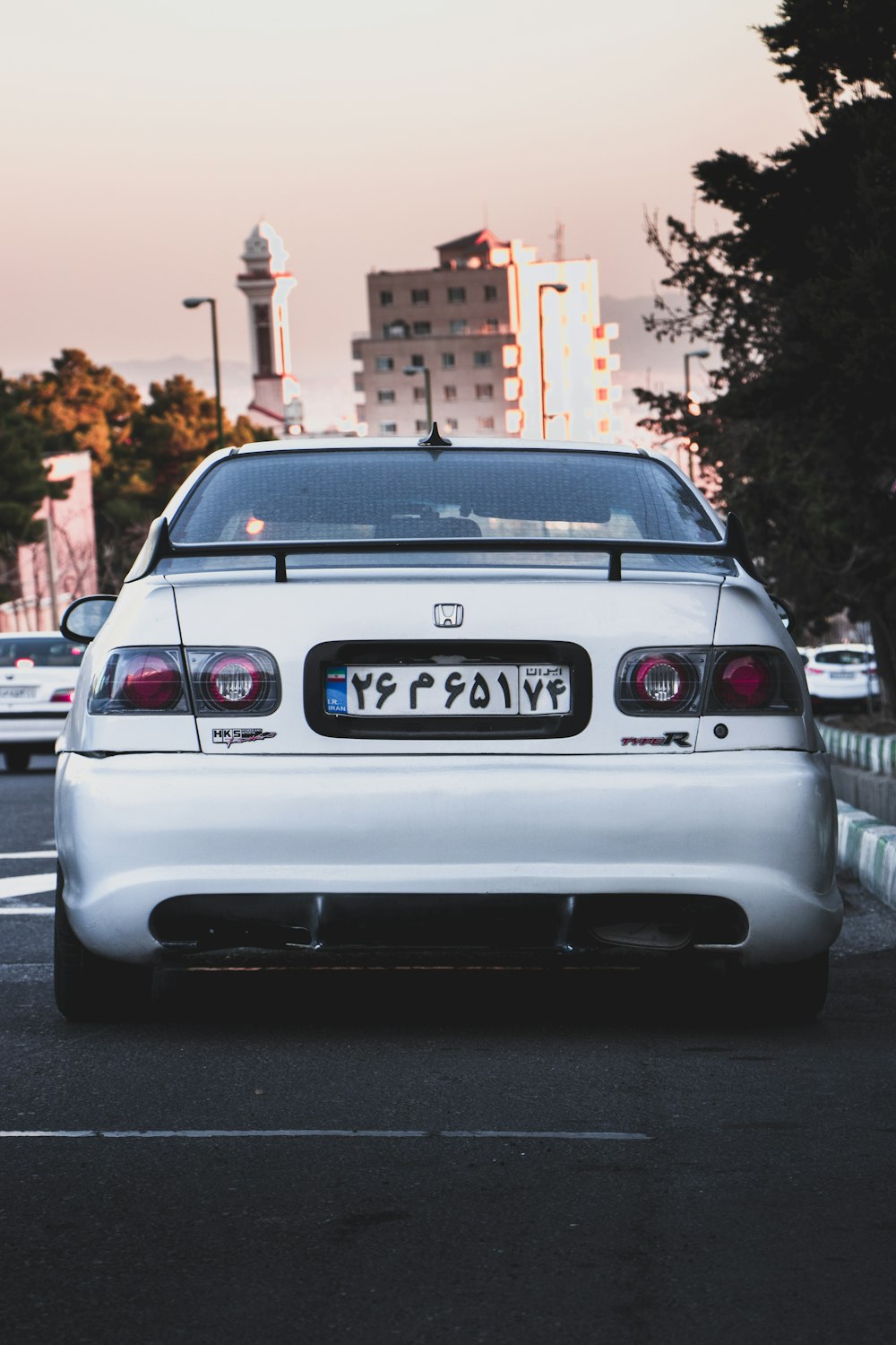 white bmw m 3 on road during daytime