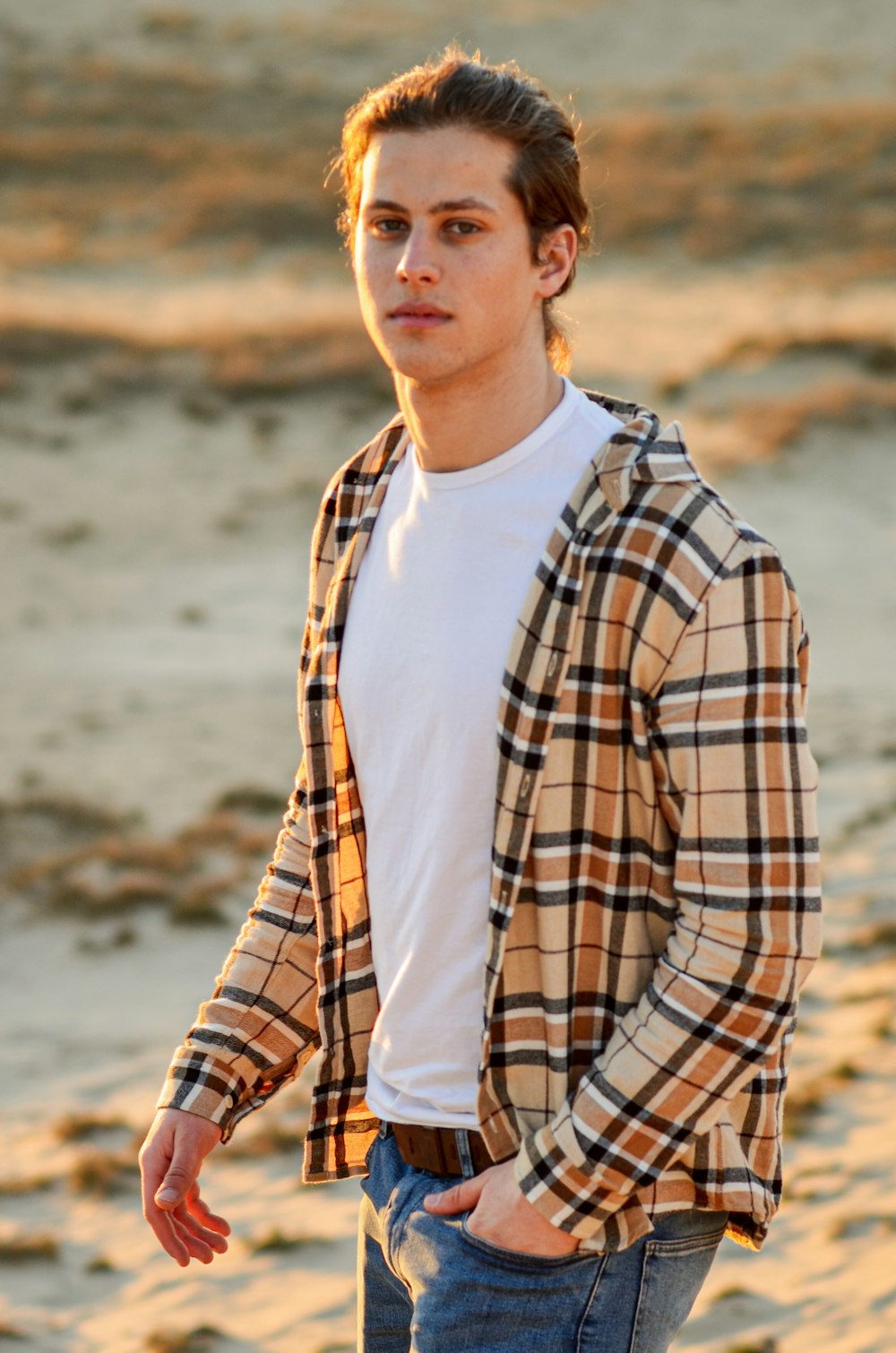 man in white and blue plaid dress shirt