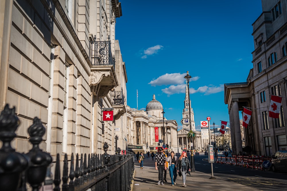 people walking on street near building during daytime