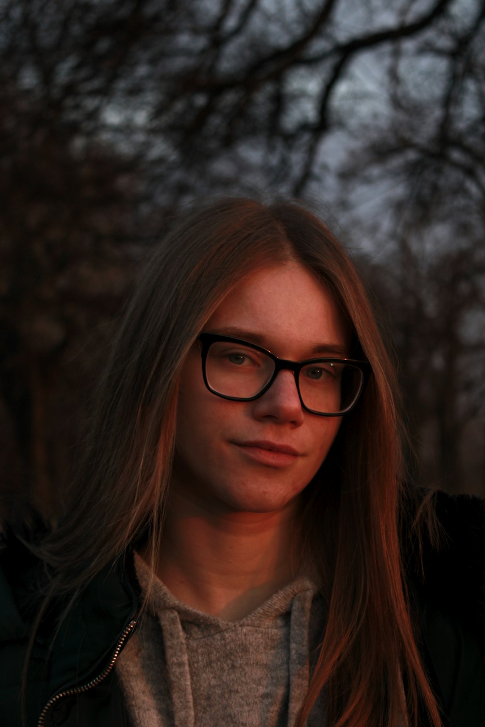 woman in black framed eyeglasses