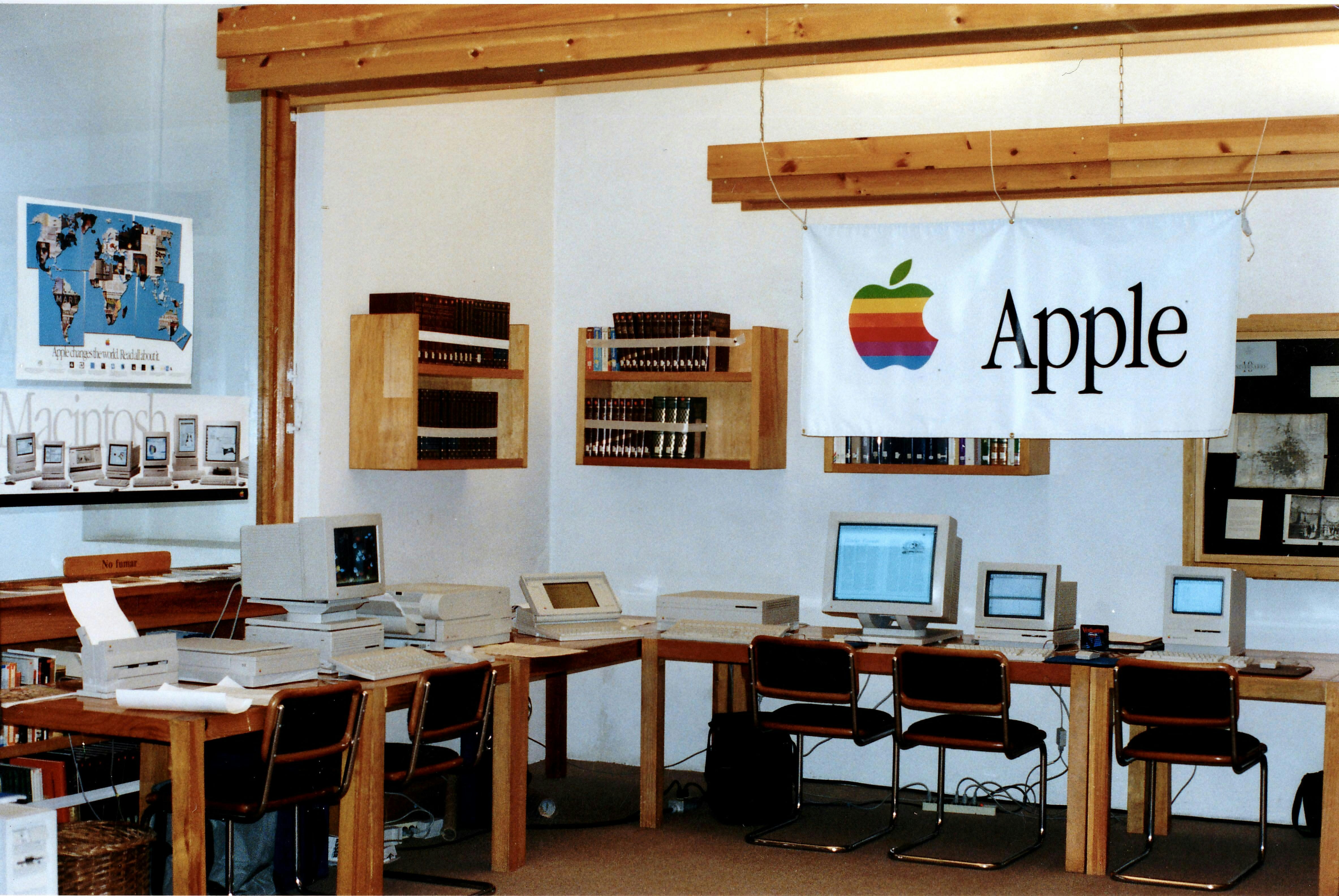Vintage Apple Inc. Product Lineup Featuring the Iconic Six-Color Apple Logo.