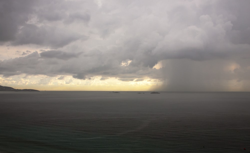 ocean under cloudy sky during daytime