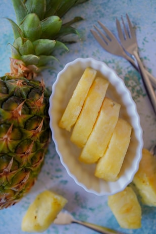 Screenshot of Meal Quest gameplay showing the pineapple character in the magical fridge realm.