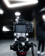 Behind-the-scenes view of a technician reviewing face swap quality on a monitor