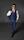 Close-up of a confident man in a tailored suit, showcasing sophisticated luxury fashion accessories.