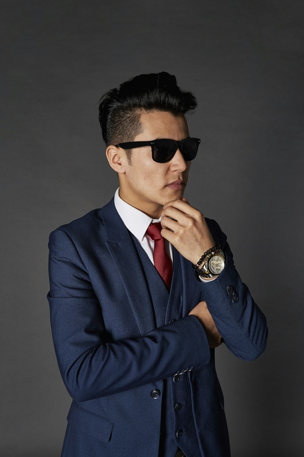 man in black suit wearing black sunglasses