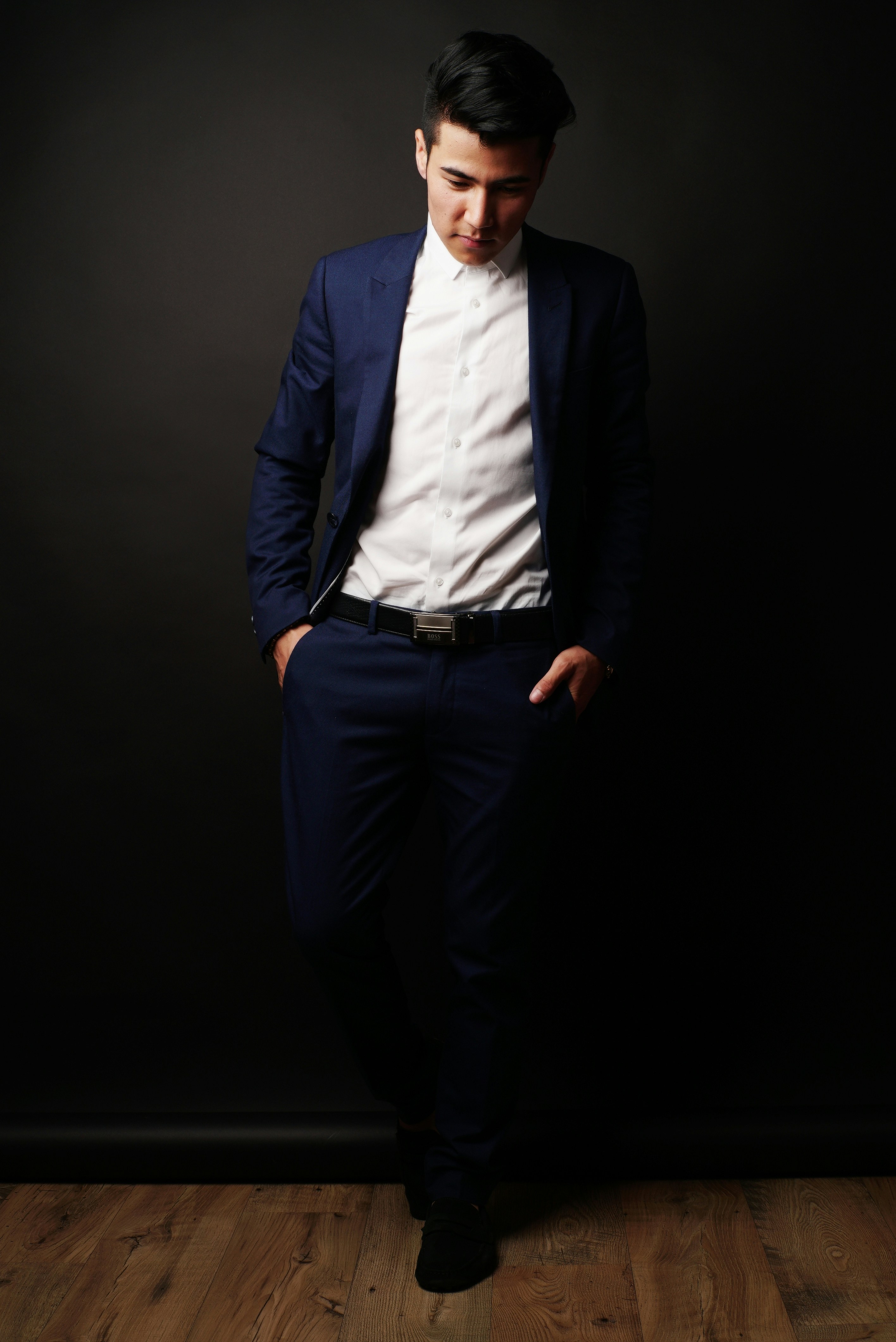 man in blue suit jacket and black dress pants photo – Free Image on