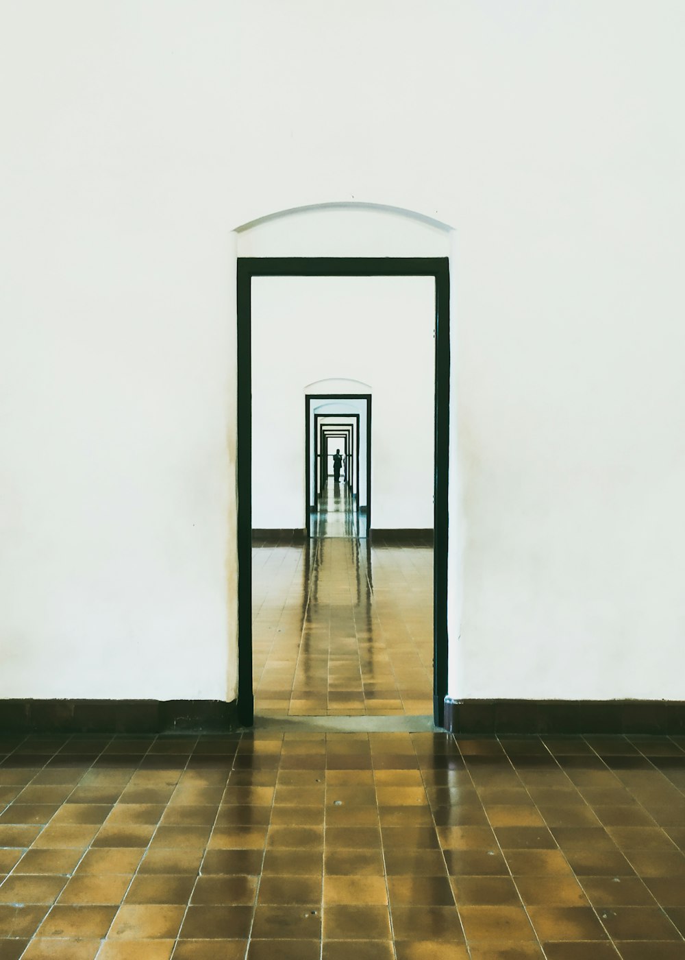 white and brown wooden hallway