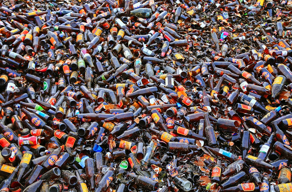 brown and black cigarette butts on the ground