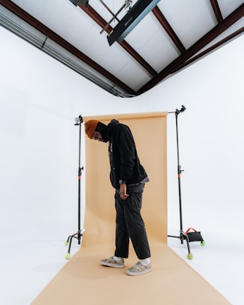 A minimalist streetwear look captured in studio lighting.