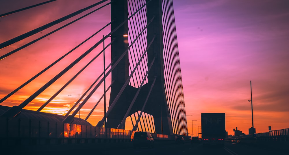 silhouette of bridge during sunset