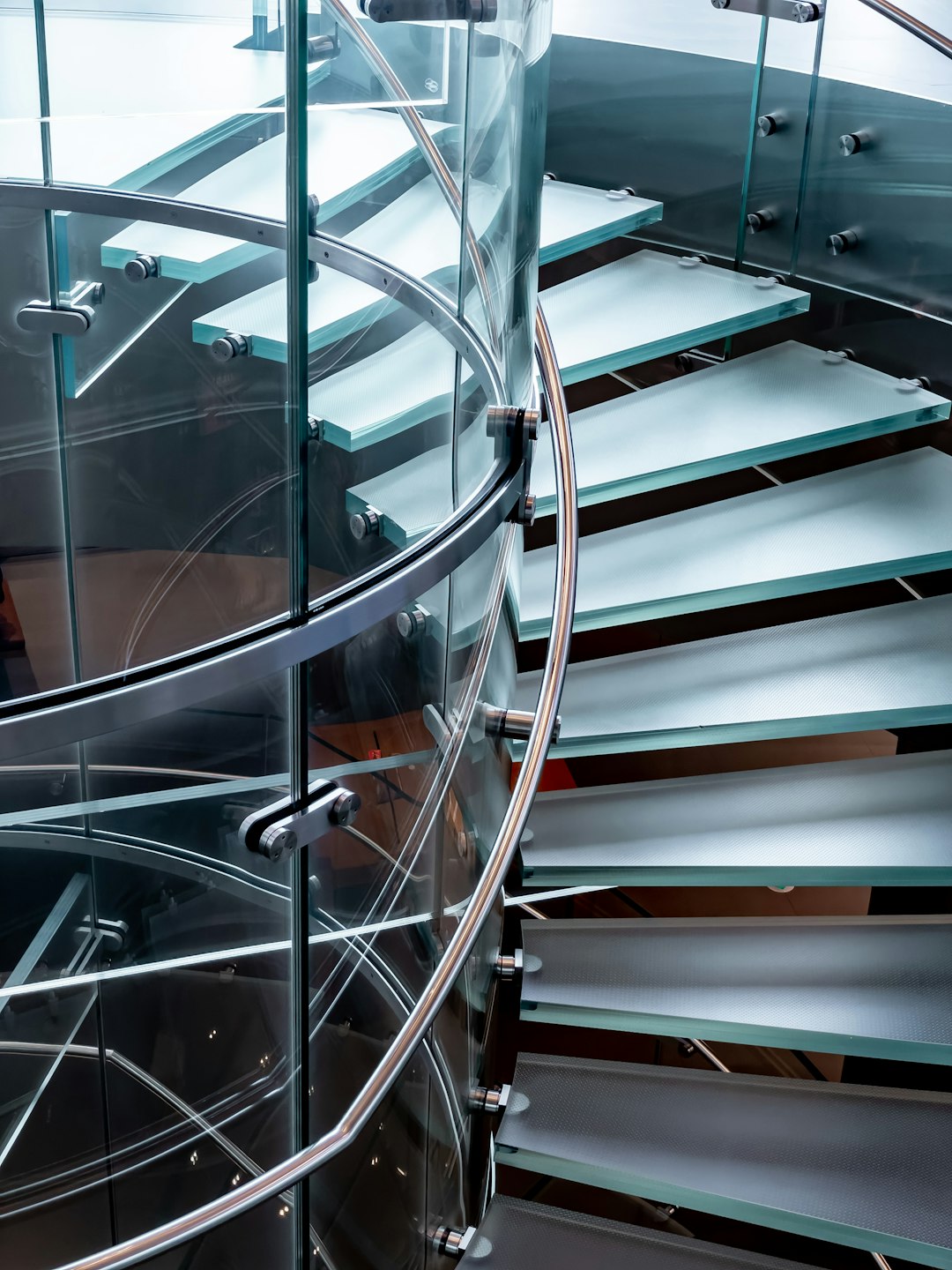 white and brown spiral staircase