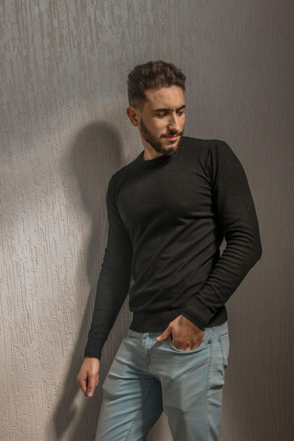man in black long sleeve shirt and blue denim jeans photo – Free Morocco  Image on Unsplash