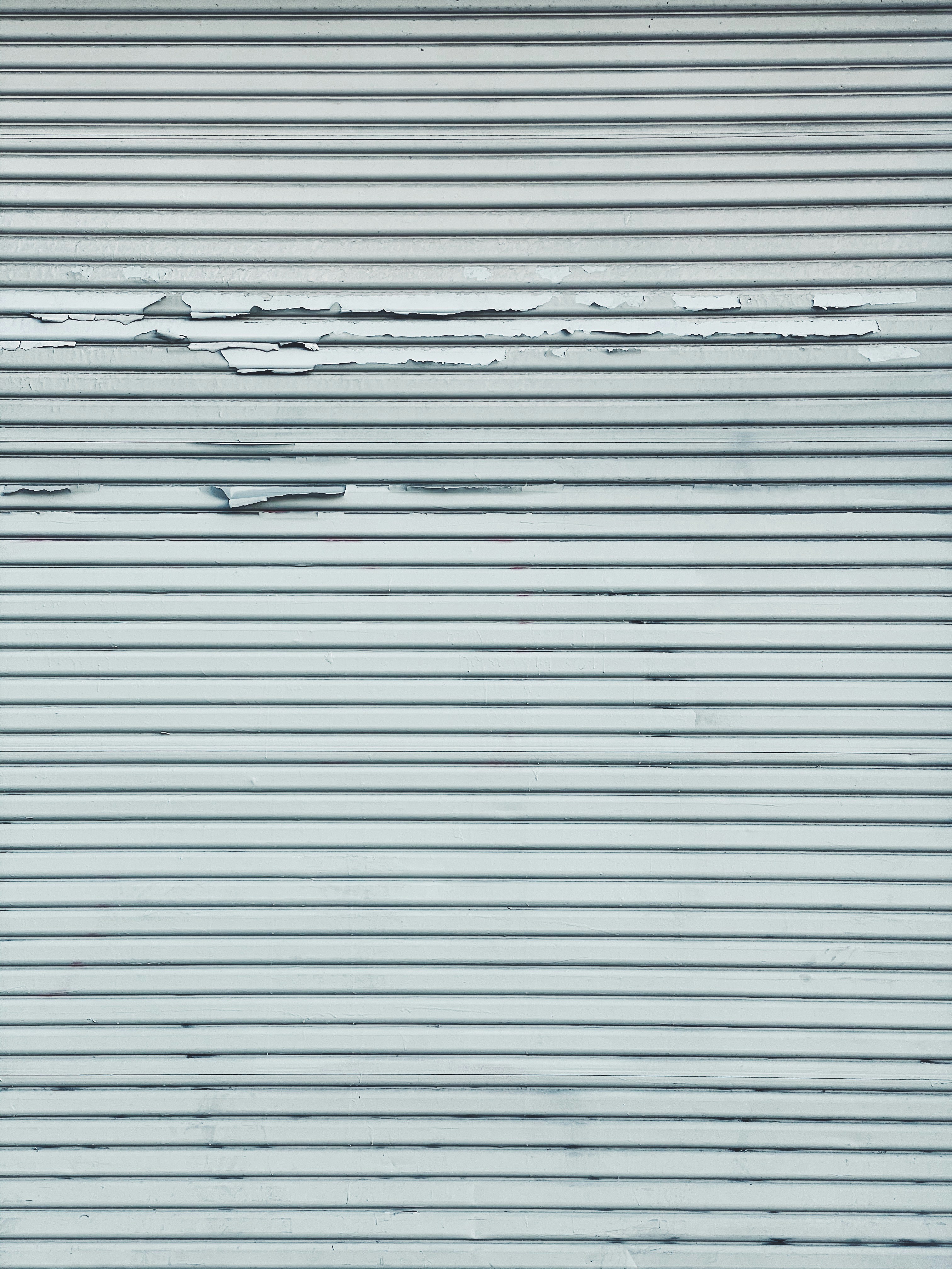 white and black striped textile