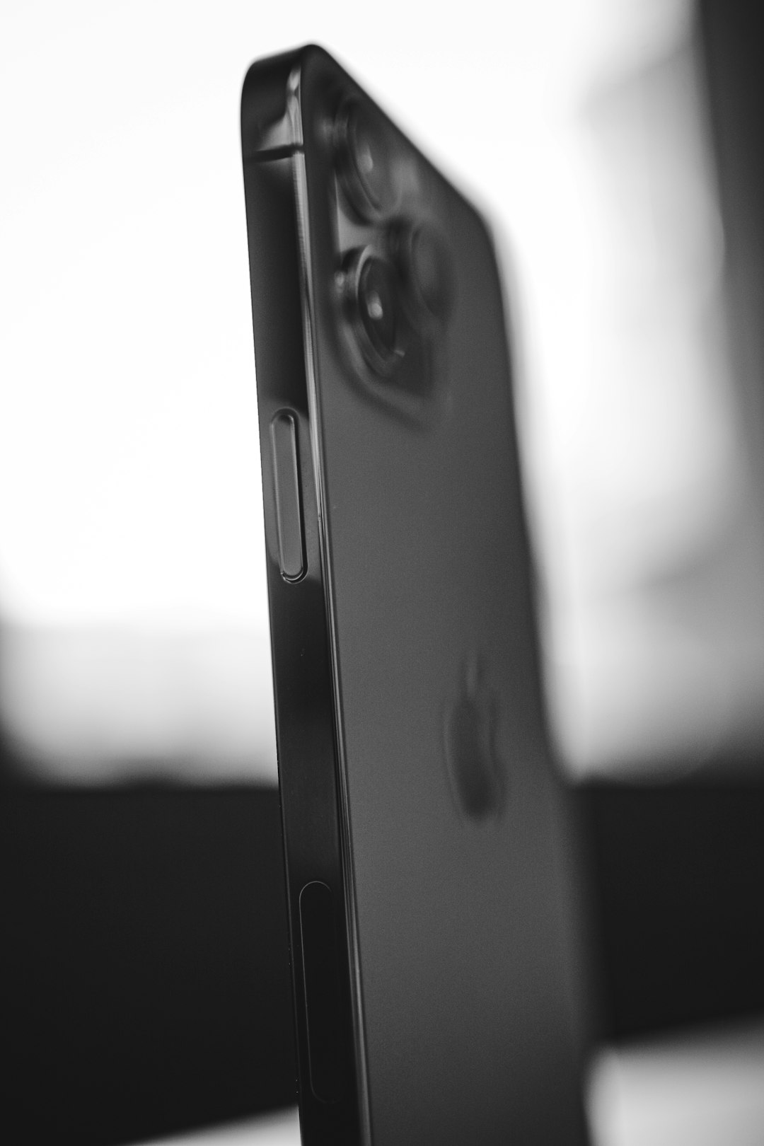 black and white photo of a smartphone