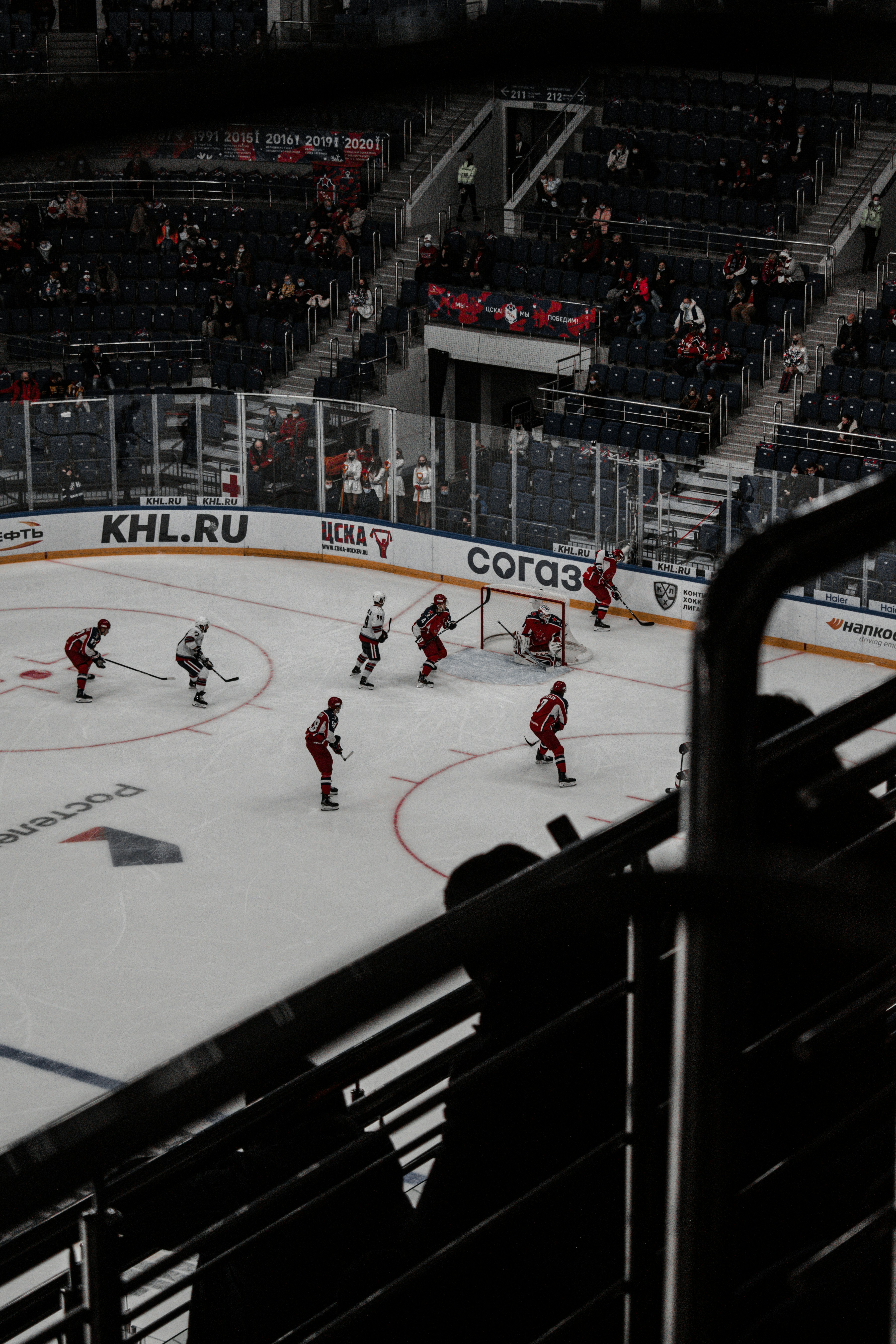 people playing ice hockey on ice hockey field