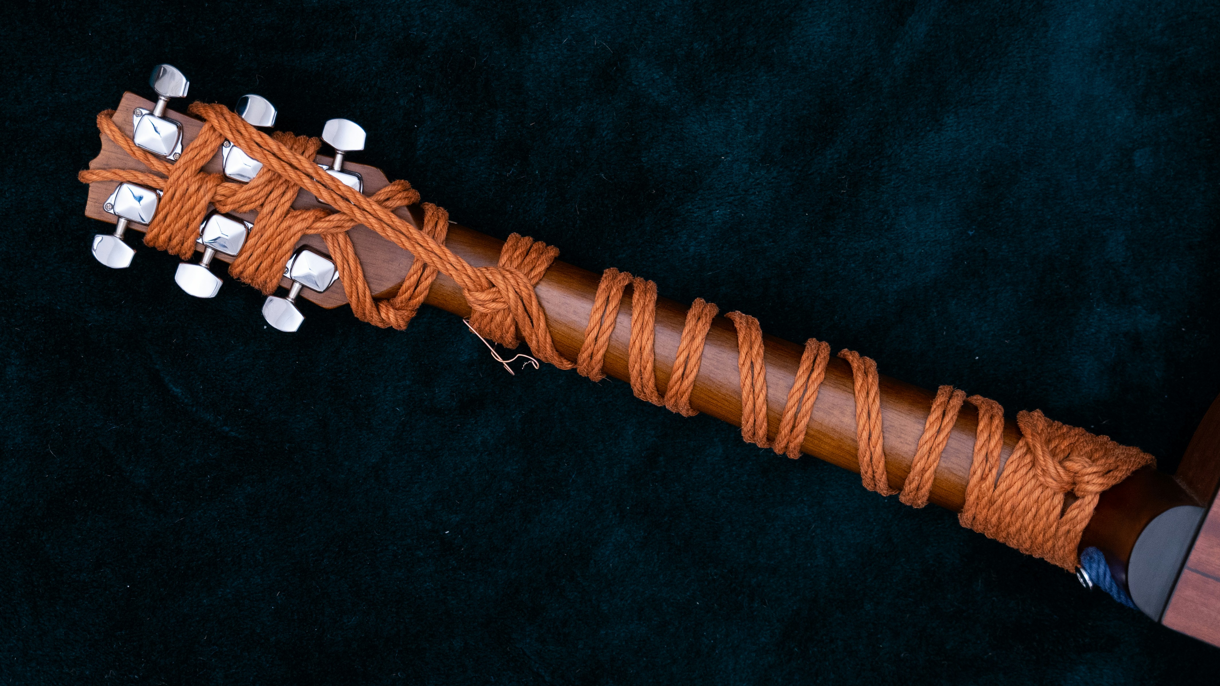 brown rope on black textile