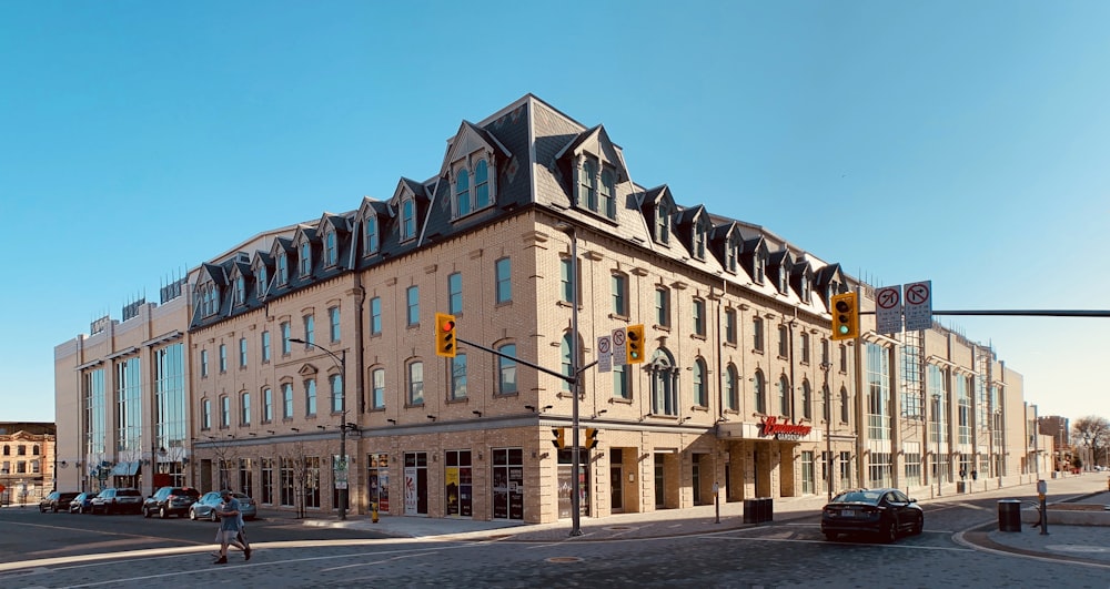 beige and brown concrete building under blue sky during daytime