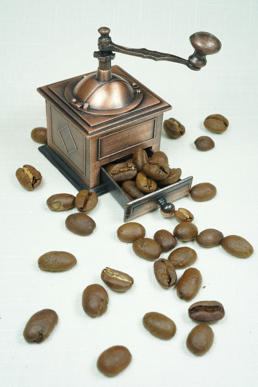 brown and beige stones beside brown wooden box
