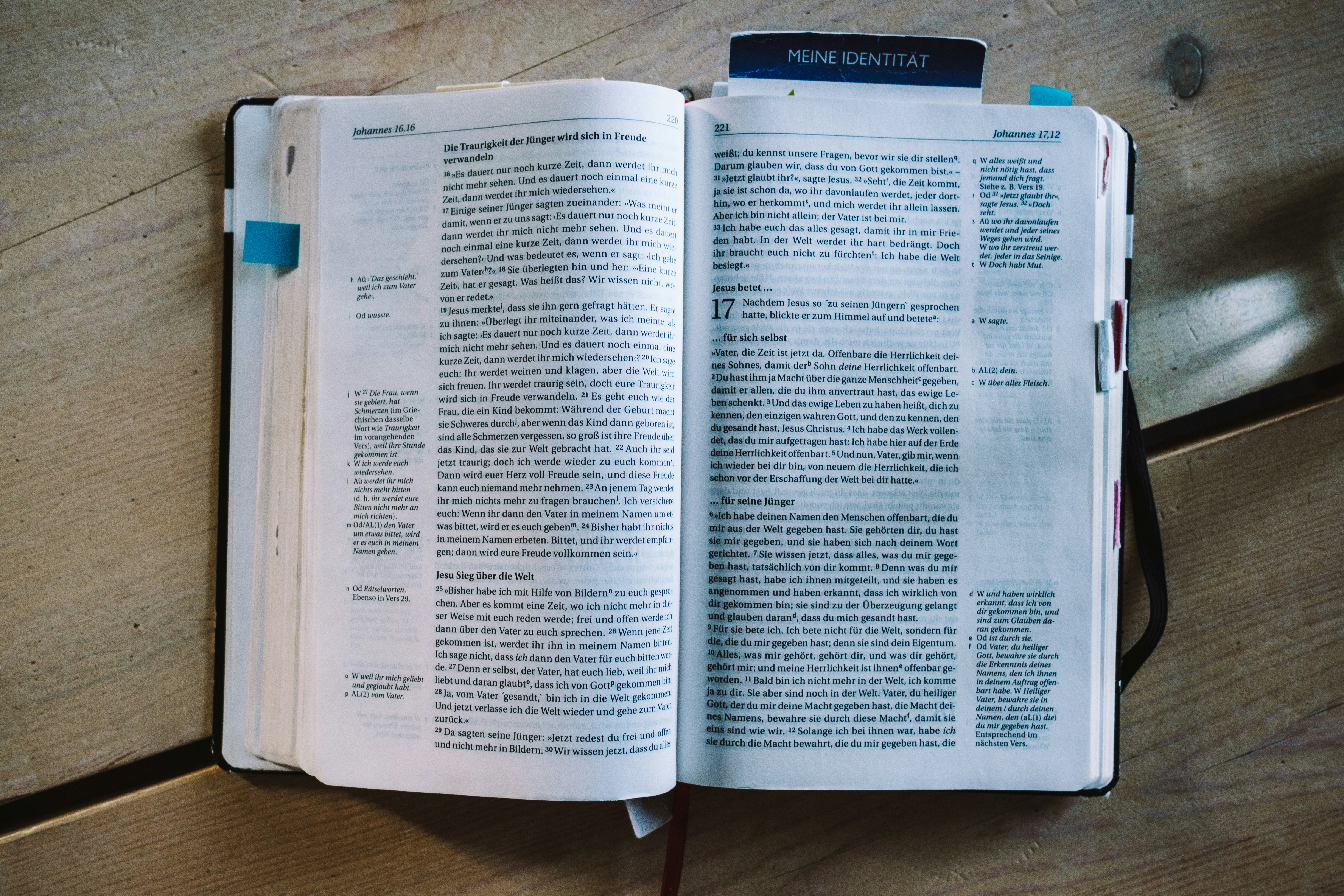 white book page on brown wooden table