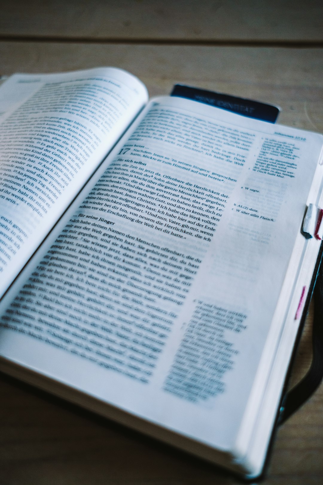 white book page on brown wooden table