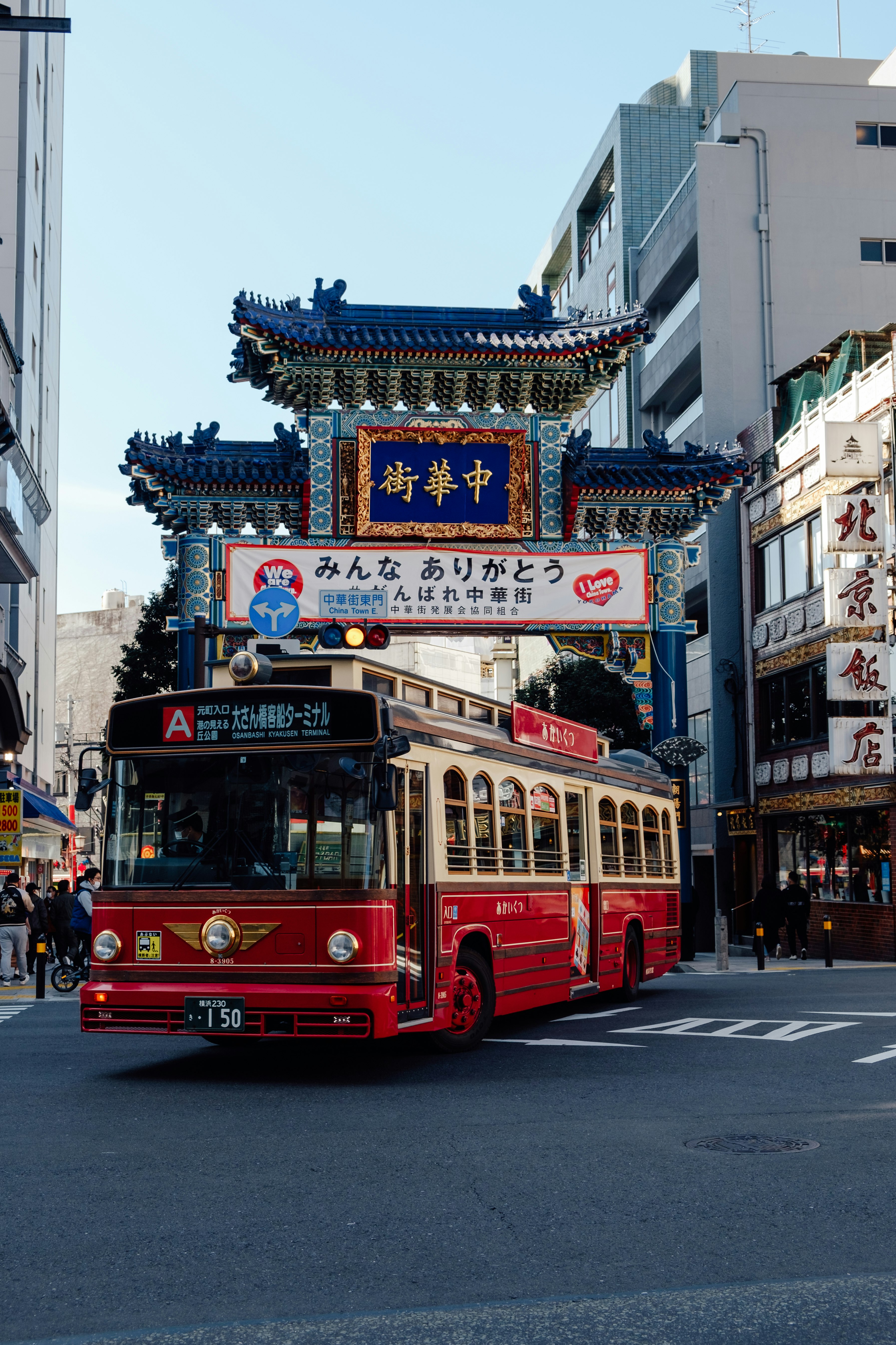 red double decker bus on road during daytime