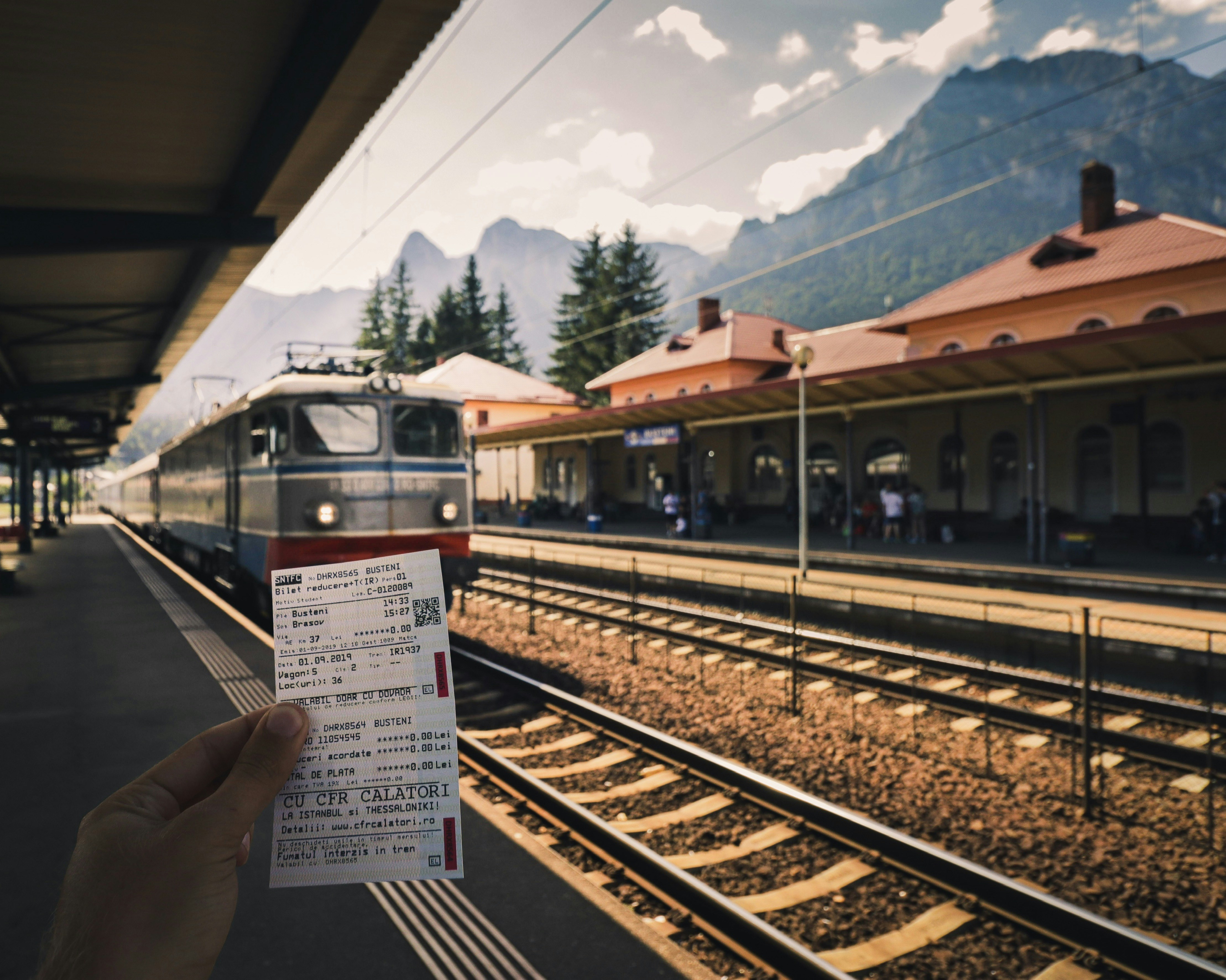A split image showing an outdated, cluttered train ticket booking interface on one side and a sleek, modern, user-friendly design on the other, illustrating the before and after transformation.