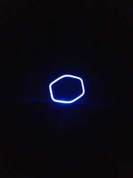 Visualization of a particle's path illustrating gauge holonomy in a quantum field.