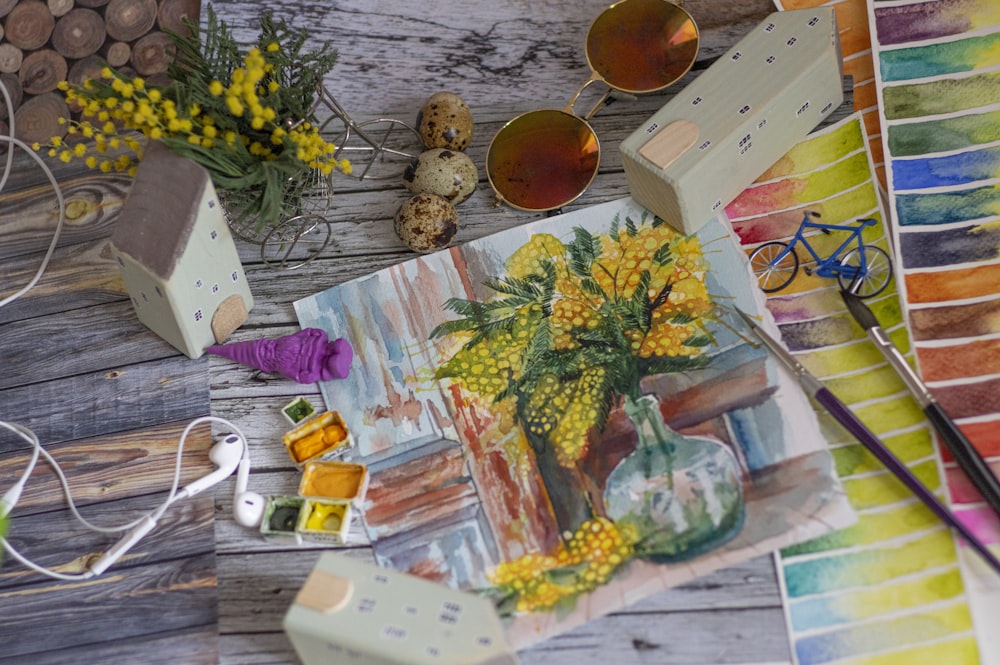 yellow flowers on brown wooden table